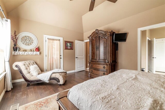 4417 Man O War Dr, Edmond, OK 73025 - bedroom featuring dark wood-style floors and high vaulted ceiling