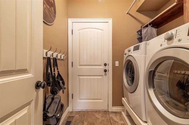 4417 Man O War Dr, Edmond, OK 73025 - washroom featuring washer and dryer and baseboards