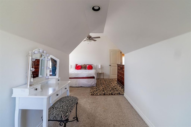 4417 Man O War Dr, Edmond, OK 73025 - bedroom featuring light colored carpet, vaulted ceiling, and a ceiling fan