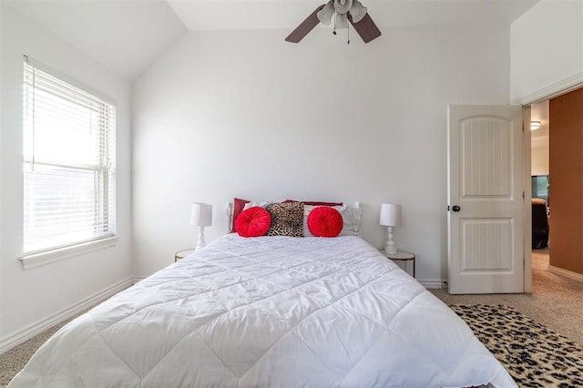 4417 Man O War Dr, Edmond, OK 73025 - carpeted bedroom with vaulted ceiling and ceiling fan