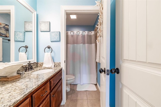 4417 Man O War Dr, Edmond, OK 73025 - bathroom featuring vanity, tile patterned flooring, and curtained shower