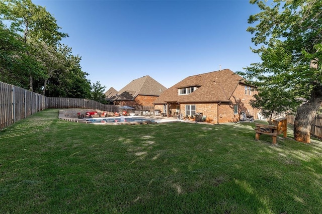 4417 Man O War Dr, Edmond, OK 73025 - fenced backyard featuring a patio area