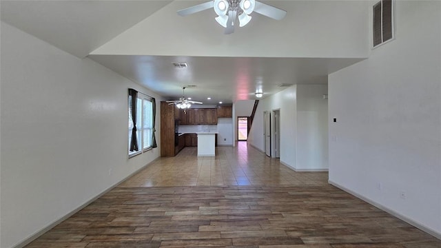 3441 NW 176th St, Edmond, OK 73012 - unfurnished living room featuring a ceiling fan and dark wood-type flooring