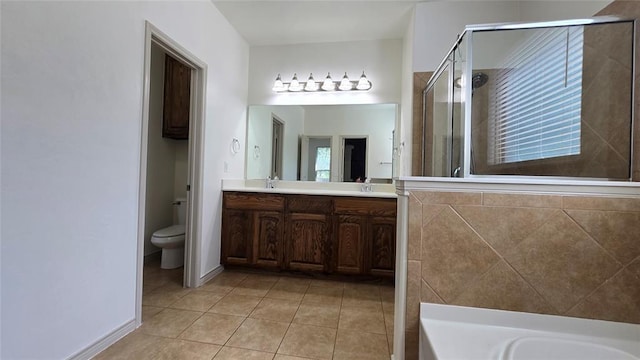 3441 NW 176th St, Edmond, OK 73012 - full bath featuring double vanity, a shower stall, tile patterned flooring, and a bath