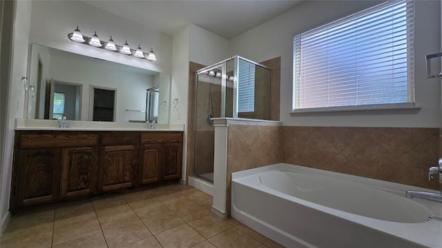 3441 NW 176th St, Edmond, OK 73012 - full bath with a bath, a stall shower, healthy amount of natural light, and tile patterned floors