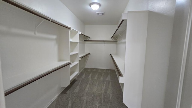 3441 NW 176th St, Edmond, OK 73012 - spacious closet with dark colored carpet