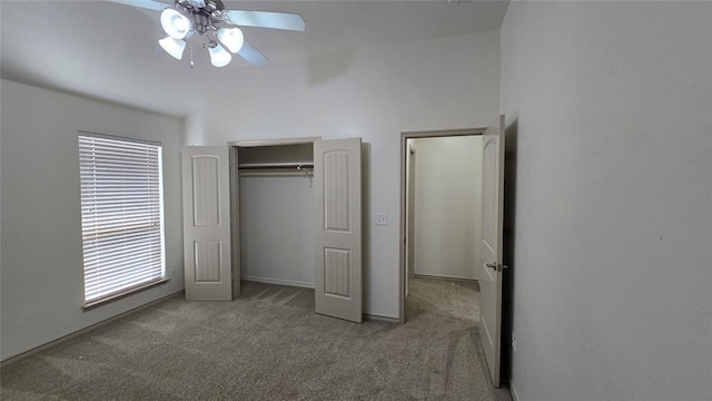 3441 NW 176th St, Edmond, OK 73012 - unfurnished bedroom with carpet, vaulted ceiling, a closet, and a ceiling fan