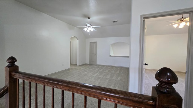 3441 NW 176th St, Edmond, OK 73012 - hallway featuring carpet floors, lofted ceiling, and arched walkways