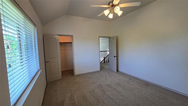 3441 NW 176th St, Edmond, OK 73012 - unfurnished bedroom featuring lofted ceiling, carpet flooring, a walk in closet, a closet, and ceiling fan
