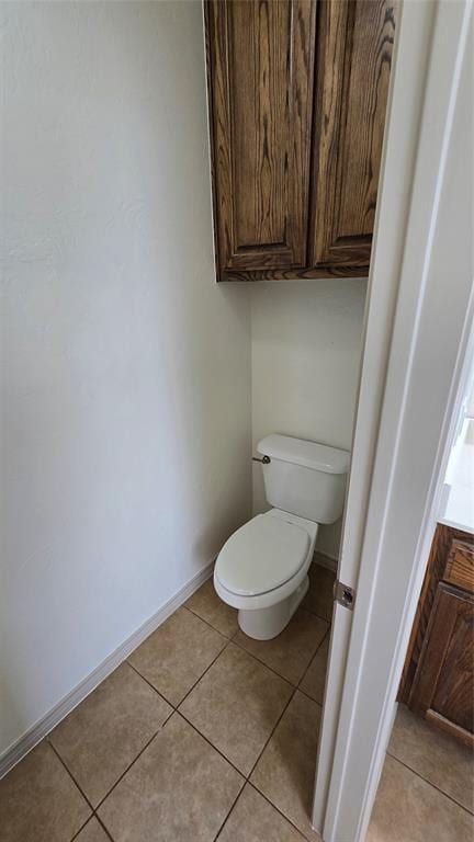 3441 NW 176th St, Edmond, OK 73012 - bathroom featuring toilet and tile patterned flooring