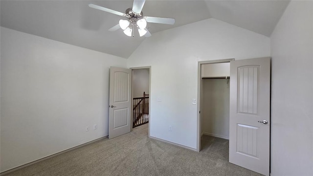 3441 NW 176th St, Edmond, OK 73012 - unfurnished bedroom with vaulted ceiling, a walk in closet, carpet floors, a ceiling fan, and a closet