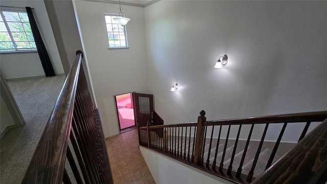 3441 NW 176th St, Edmond, OK 73012 - stairs featuring healthy amount of natural light and crown molding