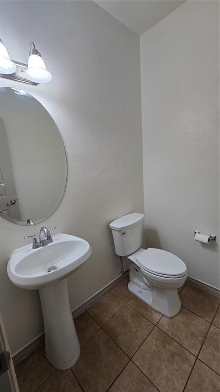 3441 NW 176th St, Edmond, OK 73012 - bathroom with toilet and tile patterned flooring