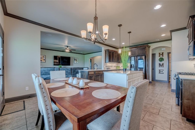 11620 Mallorca Dr, Oklahoma City, OK 73173 - dining room featuring arched walkways, crown molding, a ceiling fan, recessed lighting, and a chandelier