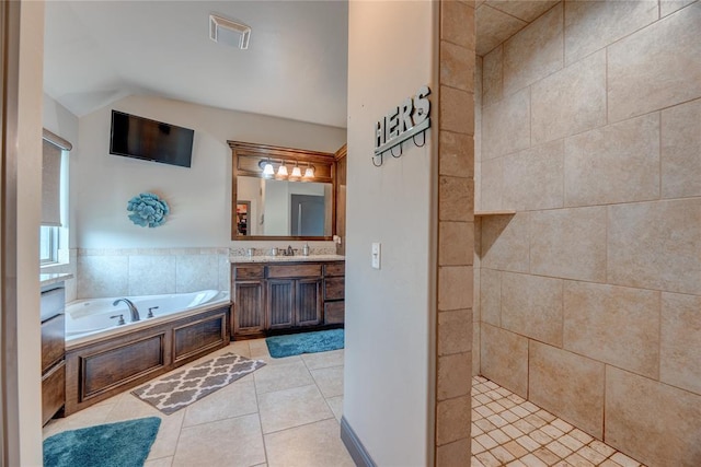 11620 Mallorca Dr, Oklahoma City, OK 73173 - full bathroom featuring vanity, a bath, lofted ceiling, tile patterned flooring, and tiled shower