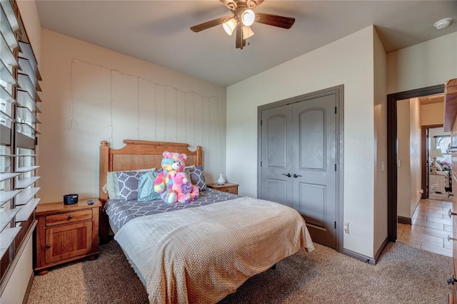 11620 Mallorca Dr, Oklahoma City, OK 73173 - bedroom with light carpet, a closet, and a ceiling fan