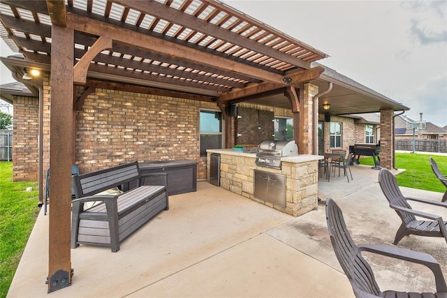11620 Mallorca Dr, Oklahoma City, OK 73173 - view of patio / terrace featuring exterior kitchen and a pergola