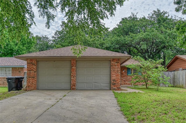 1540 Bradley Pl, Oklahoma City, OK 73127 - garage featuring driveway