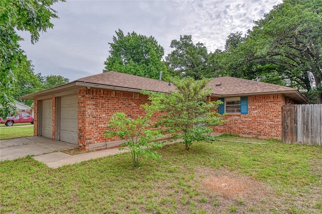 1540 Bradley Pl, Oklahoma City, OK 73127 - ranch-style home with brick siding, a garage, and a shingled roof