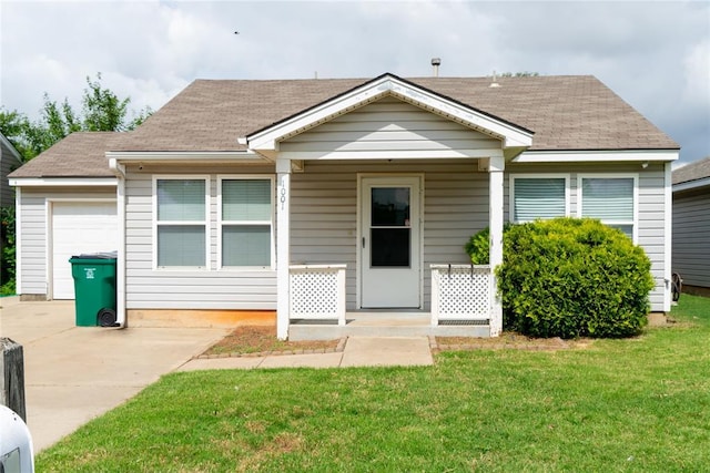 1001 Hyacinth Hollow Dr, Yukon, OK 73099 - bungalow featuring concrete driveway, an attached garage, a front lawn, and a shingled roof