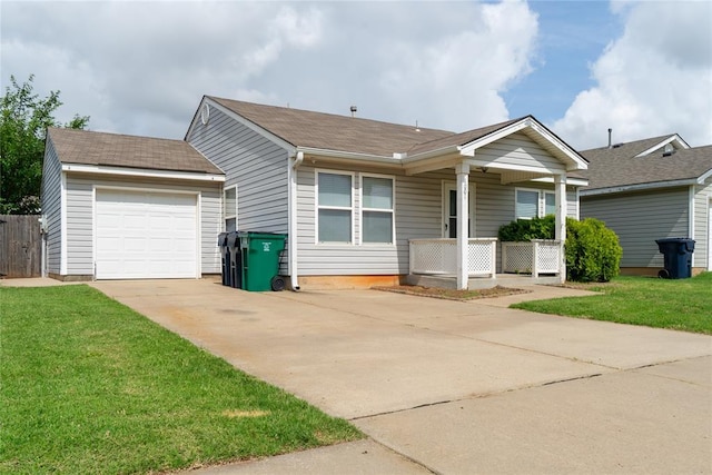 1001 Hyacinth Hollow Dr, Yukon, OK 73099 - view of front of house featuring concrete driveway, a front yard, a garage, and covered porch
