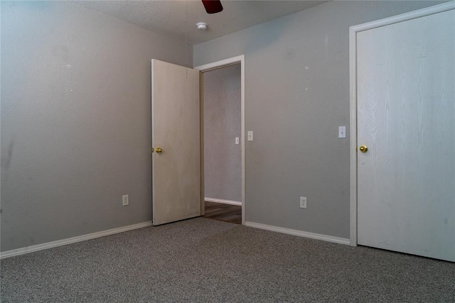 1001 Hyacinth Hollow Dr, Yukon, OK 73099 - unfurnished bedroom featuring carpet flooring and a ceiling fan