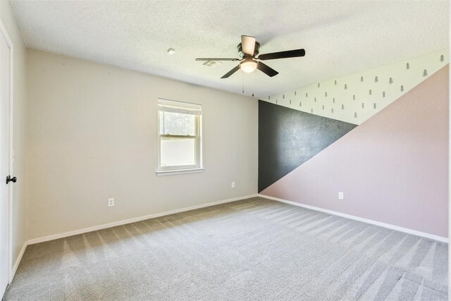2309 Morning Glory Dr, Oklahoma City, OK 73159 - carpeted spare room with a ceiling fan and a textured ceiling