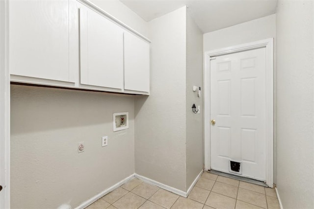 2309 Morning Glory Dr, Oklahoma City, OK 73159 - washroom with cabinet space, light tile patterned floors, hookup for a washing machine, and hookup for an electric dryer