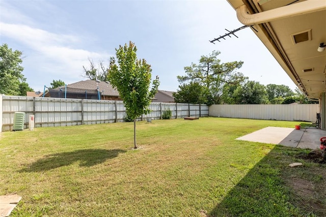 2309 Morning Glory Dr, Oklahoma City, OK 73159 - fenced backyard with a patio area
