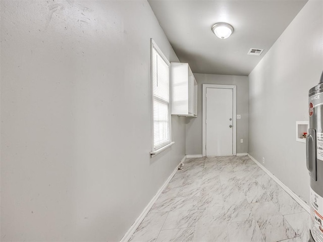 1527 NW 43rd St, Oklahoma City, OK 73118 - doorway featuring light marble finish flooring and water heater
