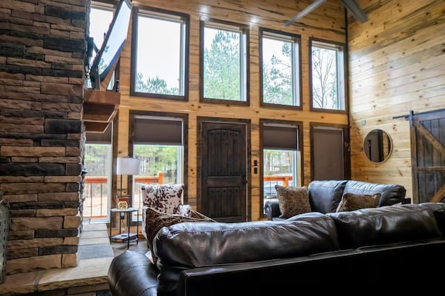 17 Honor Ct, Broken Bow, OK 74728 - living area with wooden walls and a towering ceiling