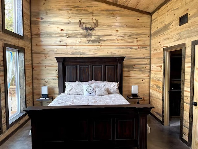 17 Honor Ct, Broken Bow, OK 74728 - bedroom with wooden walls, concrete floors, wooden ceiling, and lofted ceiling