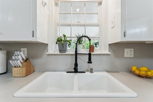 300 S Davidson Rd, Midwest City, OK 73130 - kitchen view of white cabinetry and light countertops