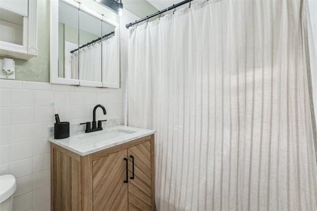 300 S Davidson Rd, Midwest City, OK 73130 - bathroom with tile walls and vanity