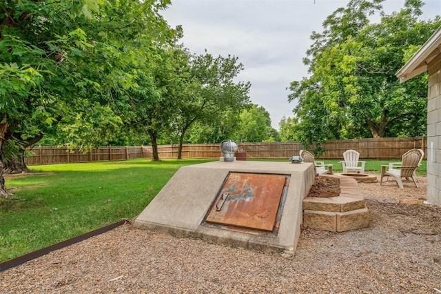 300 S Davidson Rd, Midwest City, OK 73130 - entry to storm shelter with a fenced backyard