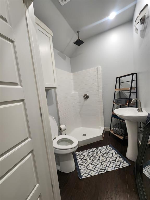 26784 Stirrup Ct, Blanchard, OK 73010 - full bath with a shower stall and wood finished floors