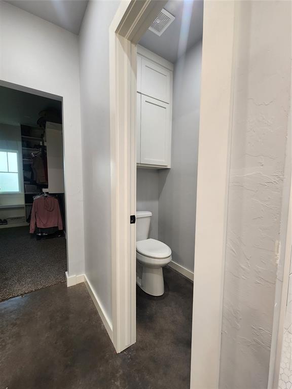 26784 Stirrup Ct, Blanchard, OK 73010 - bathroom featuring concrete flooring
