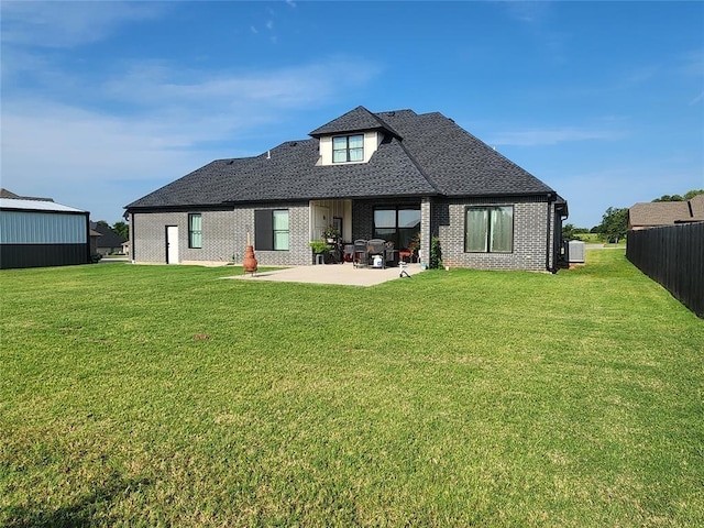 26784 Stirrup Ct, Blanchard, OK 73010 - rear view of property with a patio, brick siding, and roof with shingles