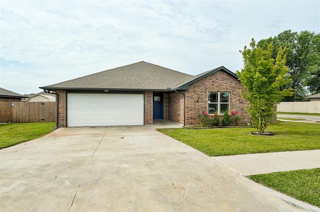 11116 SW 37th St, Mustang, OK 73064 - view of front of house featuring an attached garage, brick siding, concrete driveway, and a shingled roof