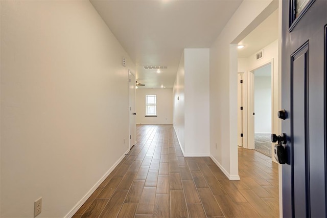 11116 SW 37th St, Mustang, OK 73064 - hall with baseboards and dark wood-type flooring