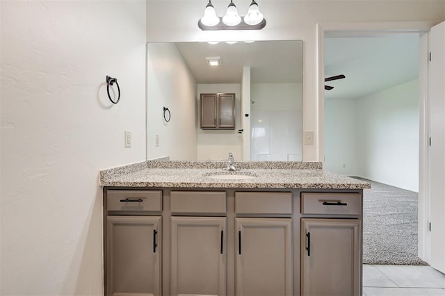 11116 SW 37th St, Mustang, OK 73064 - bathroom featuring vanity, a ceiling fan, and tile patterned floors
