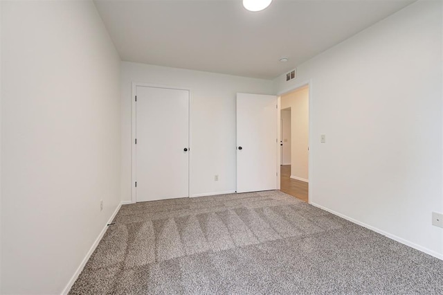 11116 SW 37th St, Mustang, OK 73064 - unfurnished bedroom with carpet flooring and baseboards