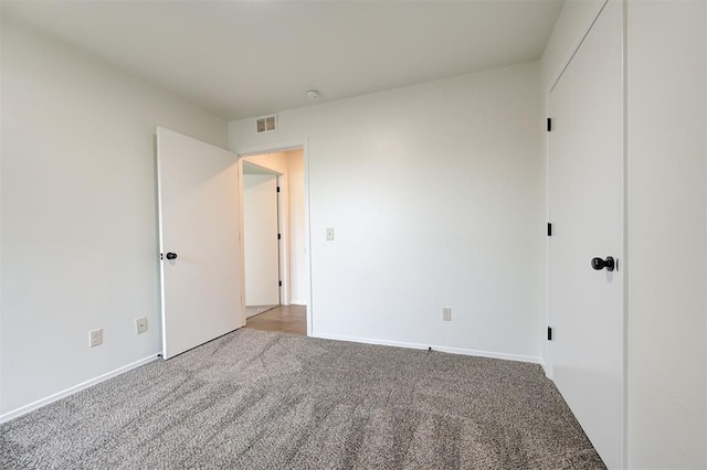 11116 SW 37th St, Mustang, OK 73064 - spare room with carpet flooring and baseboards