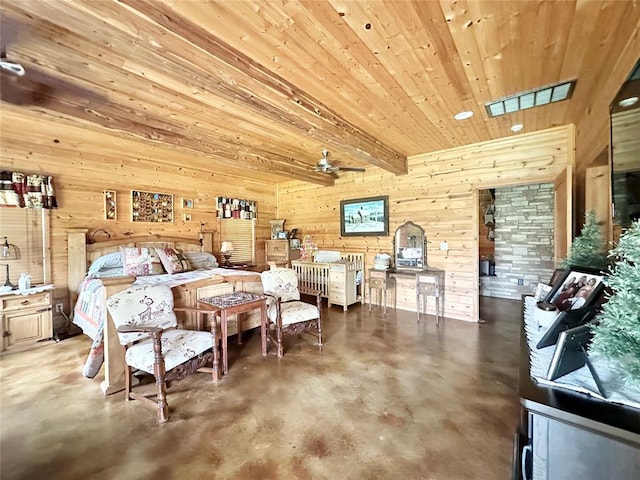 17701 S Rock Creek Rd, Shawnee, OK 74801 - bedroom featuring concrete flooring, wood walls, and a wood ceiling with exposed beams