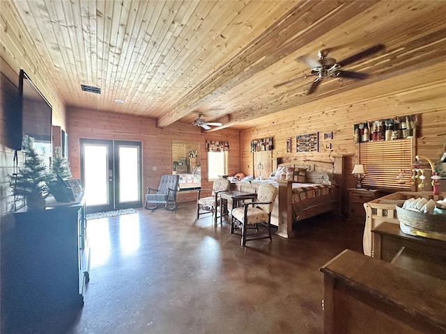 17701 S Rock Creek Rd, Shawnee, OK 74801 - bedroom featuring french doors, concrete flooring, wood walls, and wooden ceiling