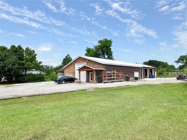 17701 S Rock Creek Rd, Shawnee, OK 74801 - view of front of property with a front yard, an outdoor structure, and an outbuilding