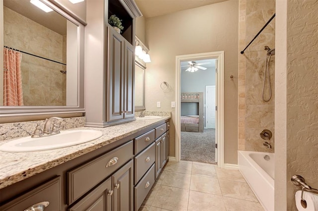2473 Vellano Ln, Edmond, OK 73034 - full bathroom with double vanity, tile patterned flooring, shower / bathtub combination with curtain, and ceiling fan