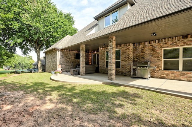 2473 Vellano Ln, Edmond, OK 73034 - view of patio featuring a trampoline and area for grilling