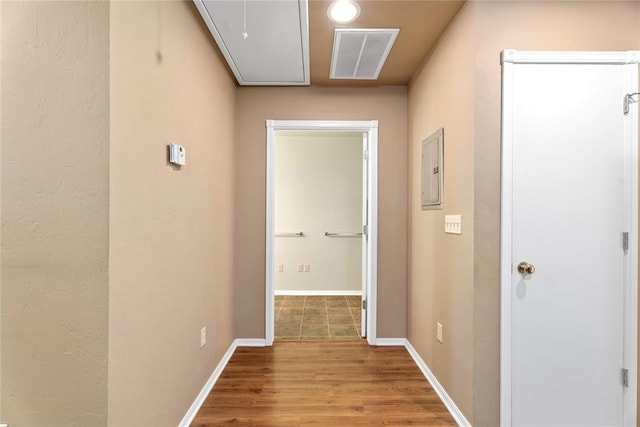 1317 Sue Ln, Choctaw, OK 73020 - hallway with attic access and wood finished floors