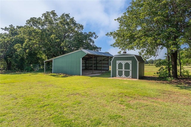 1317 Sue Ln, Choctaw, OK 73020 - view of pole building with a yard, a carport, and a shed